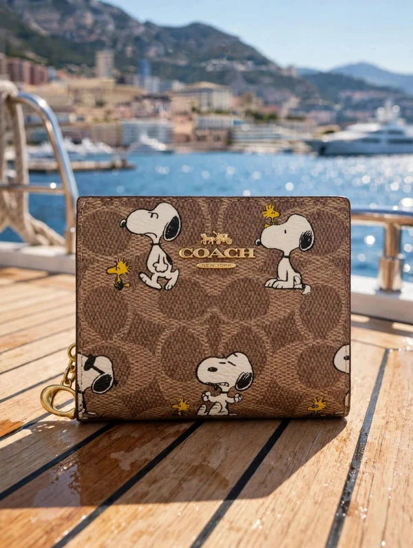 COACH X PEANUTS - Limited Edition Snoopy & Woodstock Small Zip Wallet | COACH New York Signature Canvas